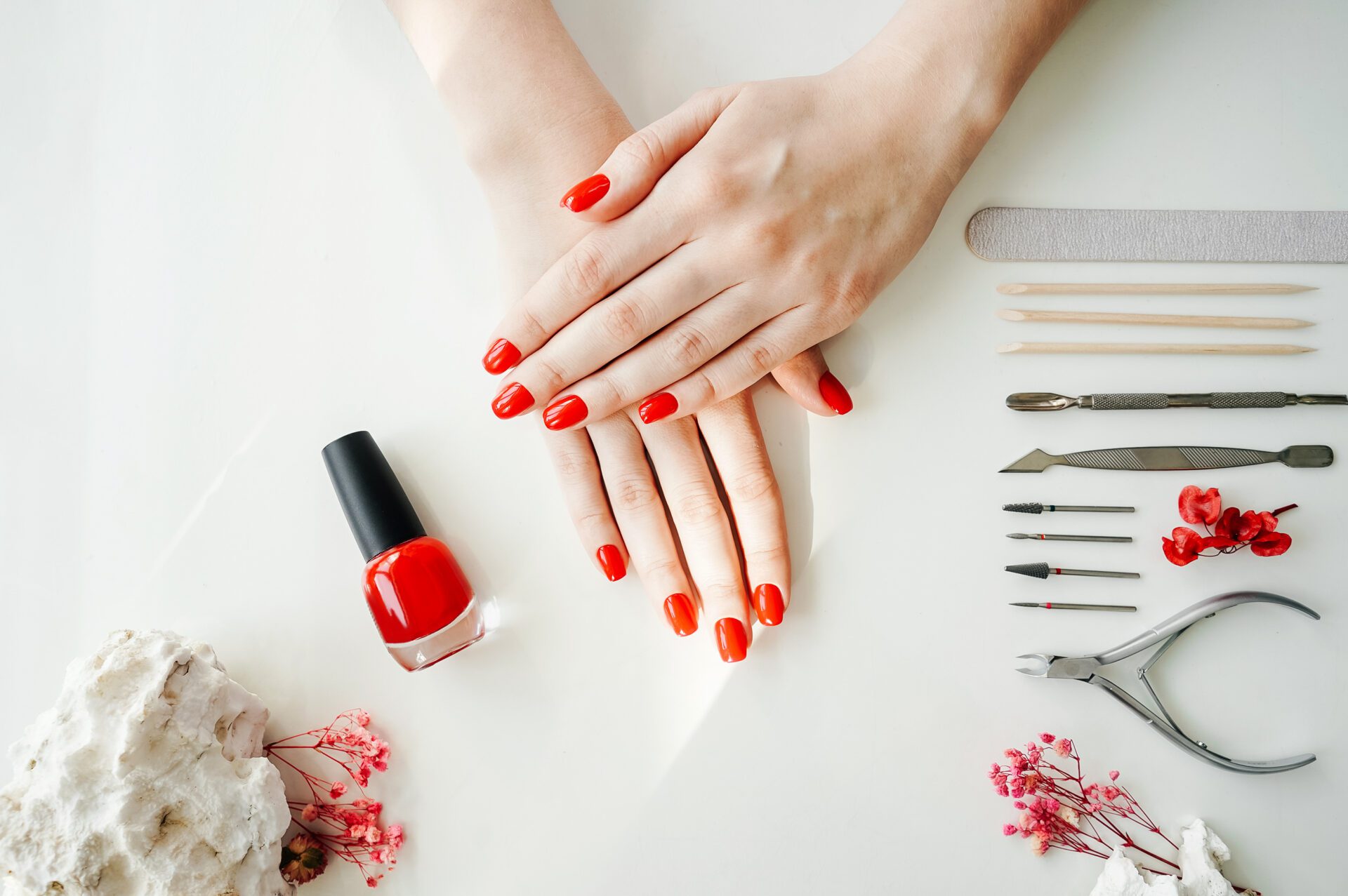 Manicured woman's nails with red nail polish. red nails